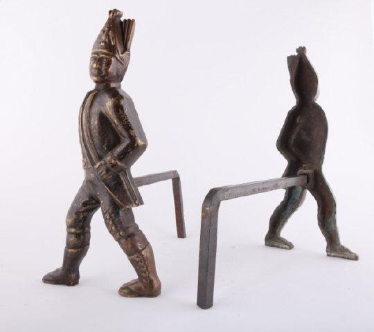 Hessian Soldier Andirons, Cast Bronze, 18th C.: Usually found in cast iron, this pair of 18th century Hessian soldier andirons are cast in bronze. Following the American revolution the Hessian motif was widely used for utilitarian applications such