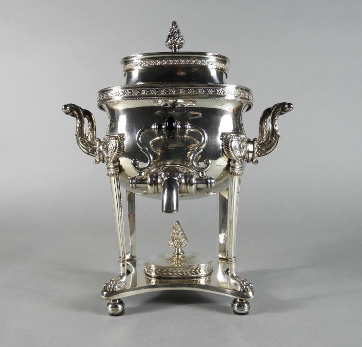 Old Sheffield Plate Regency Period Coffee Urn: A very handsome early 19th century Regency Period coffee urn in 'Old Sheffield Plate', the lidded body fitted with a levered spout and sided by ebonized wooden carrying handles, raised overall upon 4