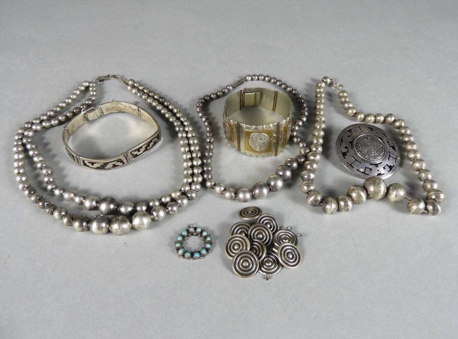 Taxco Silver Jewellery: Eight (8) pieces of Mexican silver jewellery to include: 2 Taxco bracelets, 3 beaded necklaces, a broach-pendant, a small turquoise - silver pendant, as well as 8 Taxco (round) buttons and matching cl