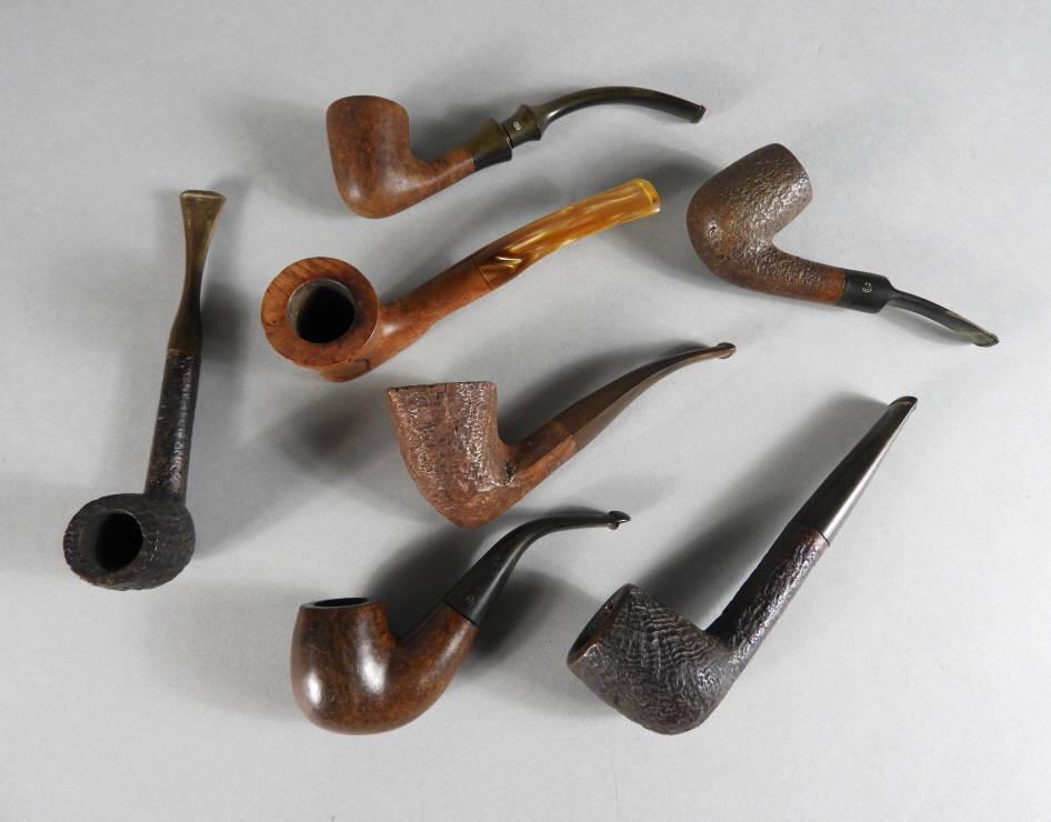 Vintage Smoking Pipes: A miscellaneous group of 7 vintage pre-owned smoking pipes, including Alpha Israel, GBD England, Saseni England, American, Amphora Holland, Georg Jensen, and Peterson Republic of Ireland.