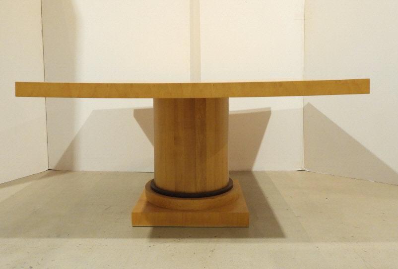 Bird's Eye Maple Centre Table, 20th Century: A large late 20th century bird's eye maple centre table, showing a book-matched veneered and cross banded square top, raised on a large fluted column mounted atop a squared plinth base. Measuring 30" 