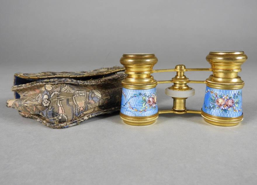 Pair of French Enamelled Opera Glasses: A pair of guilloche enamelled brass opera glasses. Signed "Arnolds Optician, Paris", with original case. 2" x 3.5".