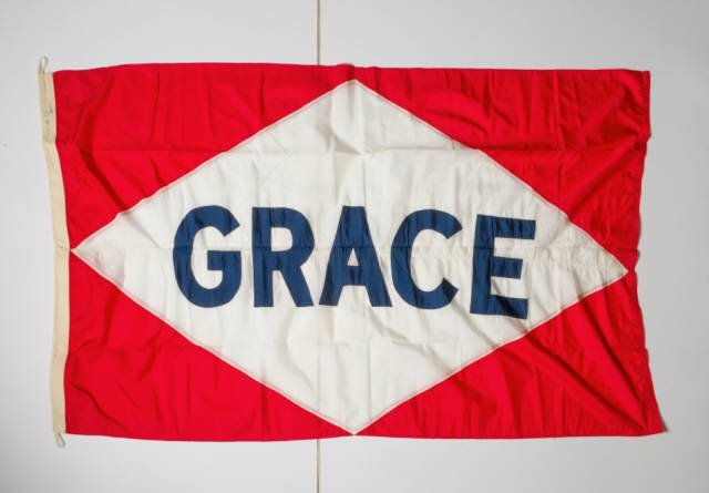 Commercial Ships' Flags: Two ship's flags: a Moore-Mc Cormack green flag, also marked "Seawave" (4' x 6'), along with a GRACE flag, also marked "Alonstar" (4' x 6').