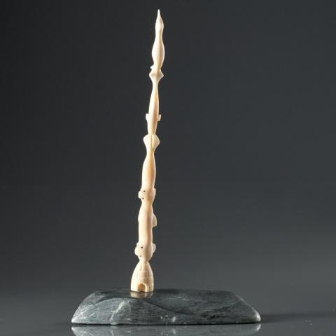 UNIDENTIFIED ARTIST, TOTEM STYLE ART: Unidentified artist, natural material & stone, totem style sculpture depicting seals, whale & seabird stacked atop an igloo, signed in syllabics. Measuring, 8” x 4.5” x 2”. CITES rul
