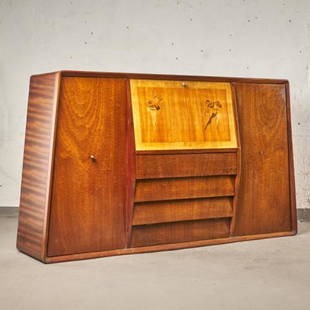 ART DECO PERIOD MARQUETRY SIDEBOARD: Continental possibly French, the figured tropical hardwood case featuring a bar with a lighted interior behind a drop down marquetry panel, over four tiers of drawers, sided by twin cabinets with