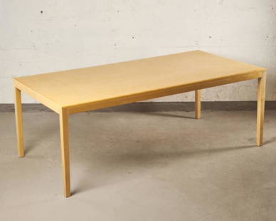 ALVAR AALTO MCM DINING TABLE: For Korhonen Oy, Finland circa 1960, the striking laminated beech top raised on four squared supports, measuring 29" high x 79" long x 39.5" deep. Provenance: The Finnish Embassy, Ottawa, Canada.
