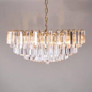 MURANO CEILING FIXTURE: Italy circa 1970, the circular brass frame housing eight sockets surrounded by nine tiers of cascading prisms, measuring 27" diameter x 12" high (minus chain & ceiling mount).