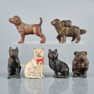 SIX CAST IRON FIGURAL BANKS: 19th / early 20th century, a bulldog embossed "Made in Canada”, measuring 3.75" x 4.75", a terrier dog, a pointer dog a Newfoundland dog, and two cats (one in white paint with red bow tie).