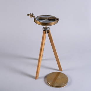 SURVEYOR COMPASS / MAGNETIC COMPASS COMPENSATOR: A cased IVER C. WEILLBACH & CO. magnet compass compensator along with the accompanying letter (box measuring 5.375" x 6.25" x 6.25"), and a brass mix surveyor compass on a wooden tripod (15" high, dia