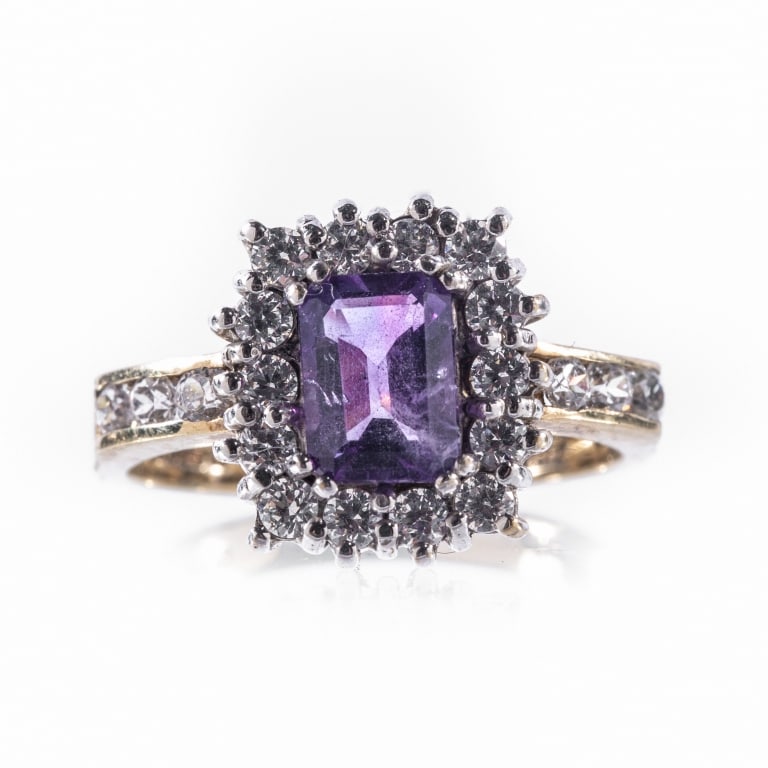 9K AMETHYST & DIAMOND RING: English hallmarked, 9K yellow gold emerald-cut amethyst and diamond ring, Sheffield mark and stamped .375 (9K), twenty round-cut diamonds, amethyst measuring 7.2mm x 5.8mm, total weight: 3.5 grams.
