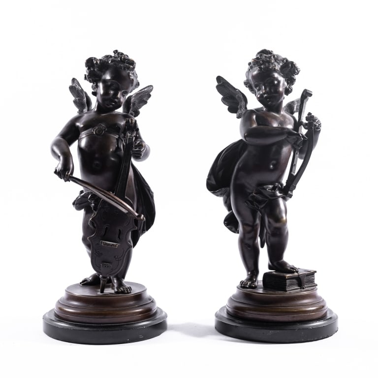 PAIR OF FRENCH BRONZE CHERUB MUSICIANS: A good pair of patinated bronze sculptures in the style of Auguste Moreau (French, 1834-1917), depicting cherub-musicians, one playing a cello, the other a harp, each stamped with number 6591 to the b