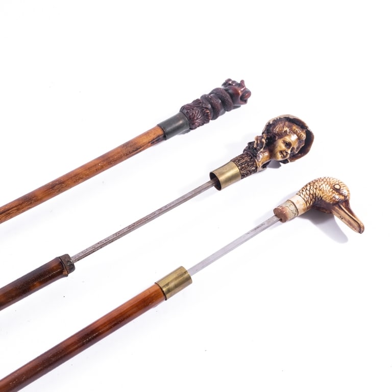 TWO SWORD CANES & ANOTHER - 5