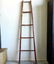 Canadiana red wooden ladder