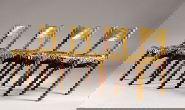 PERRIAND Charlotte (1903-1999) Group of four oak: PERRIAND Charlotte (1903-1999) Group of four oak chairs Height. 75,5cm{CR} Description French: PERRIAND Charlotte (1903-1999) {CR}Suite de quatre chaises en ch ne dossier bandeau, montant et pi tement