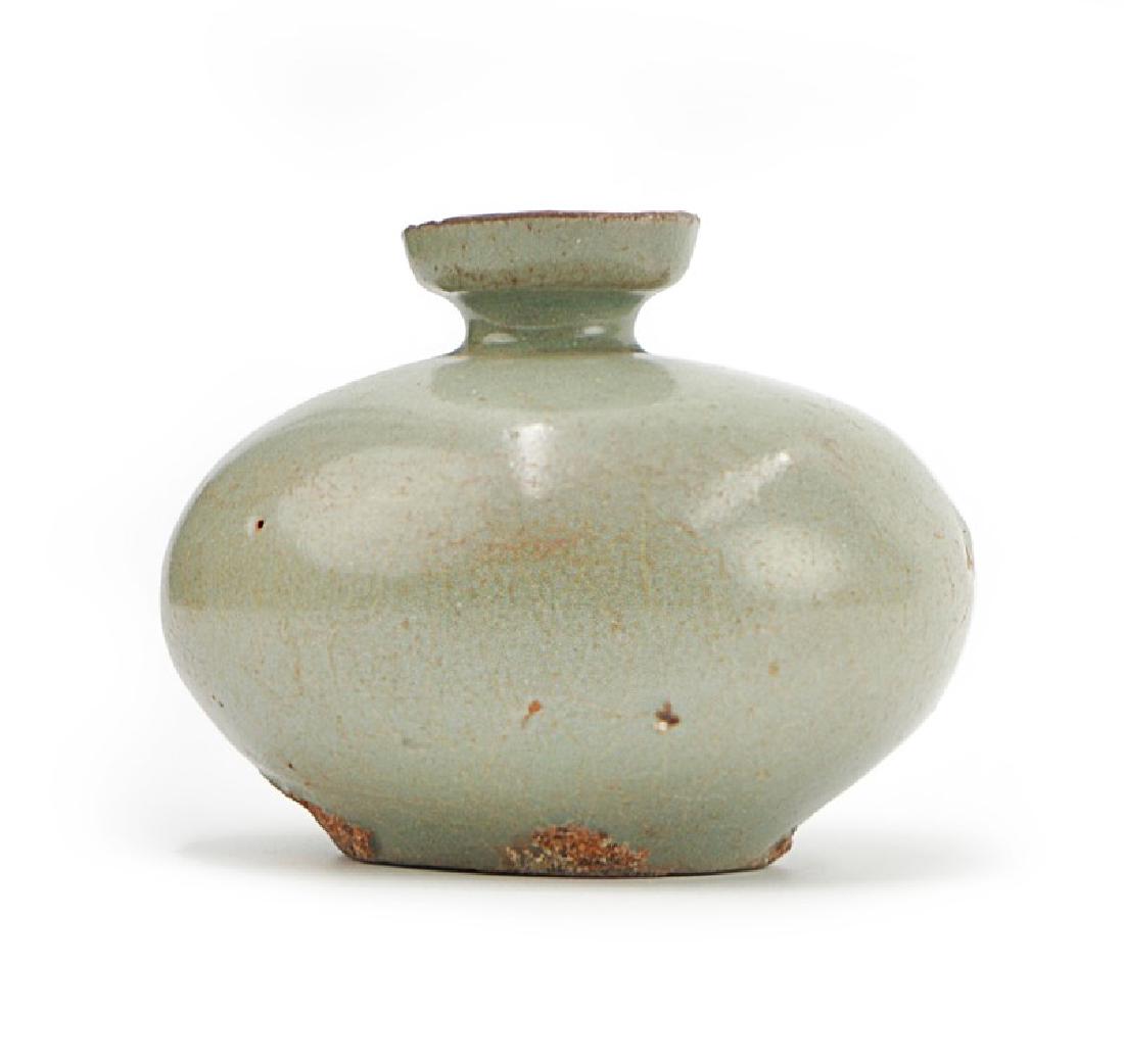 KOREAN CELADON OIL FLASK; GORYEO DYNASTY (918-1392): Korean oil bottle stoneware with celadon glaze. H:2 1/2in (6.3 cm) W:3in (7.6 cm)