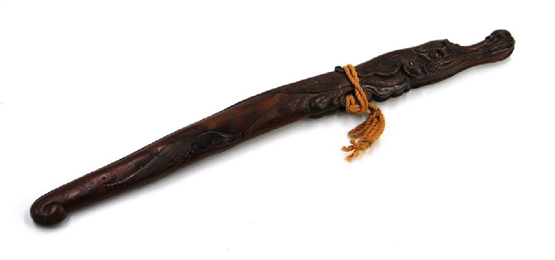DRAGON CARVED, DOCTORS SWORD; EDO PERIOD (1601-1868)Â : An unusual decorative wooden sword (tea room sword) carved of hardwood in the shape of a dragon. L:16 1/2in (41.9 cm)