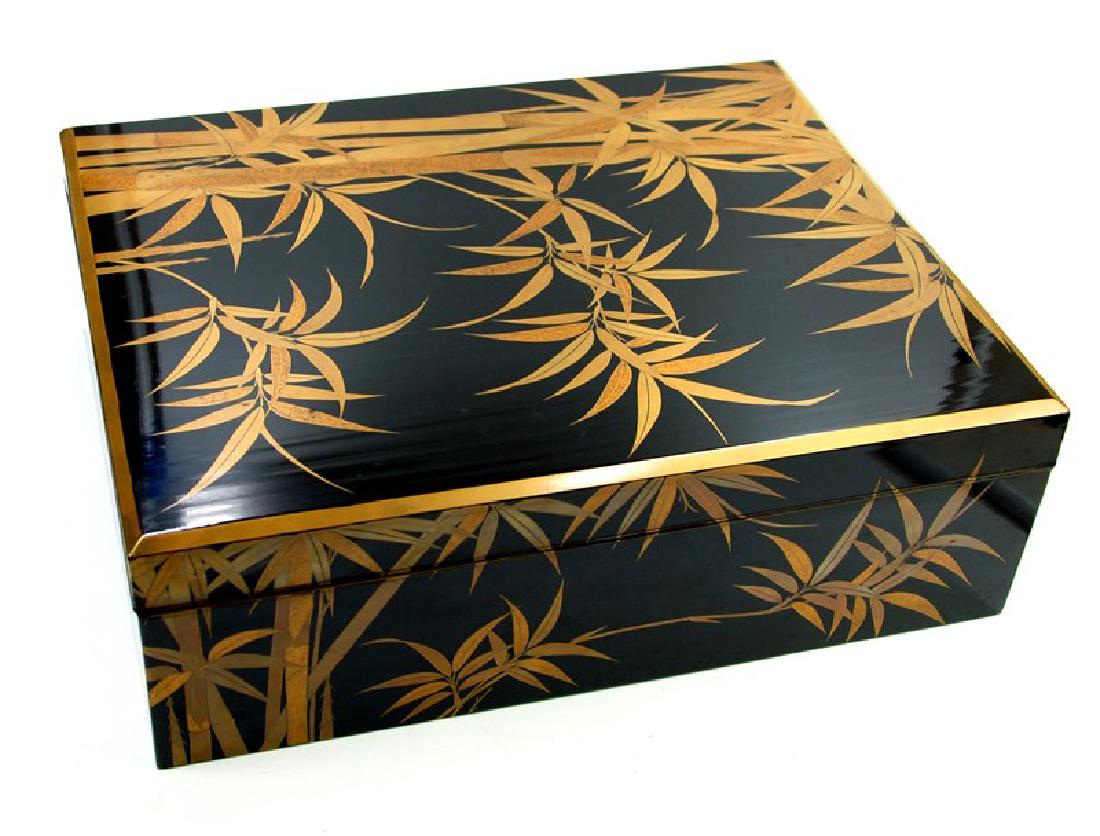 GOLD LACQUER BOX BAMBOO; EDO PERIOD (1603-1867): Rectangle Japanese shiny black lacquer box. Decorated with bright gold bamboo across the top and sideÂ H:13.5cm(5,1/4in) \W:40.5cm(15 7/8in)