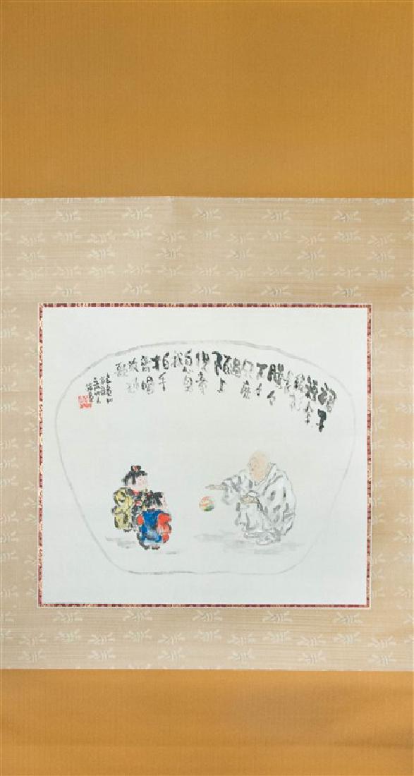 SCROLL OLDMAN PLAYING WITH KIDS: This scroll has a painting depicting an old man playing a ball with two kids, and a poem by Ryokan Taigu is on the top with signature and seal._x000D_ H:52in(132cm) W:25in(63.5cm)_x000D_