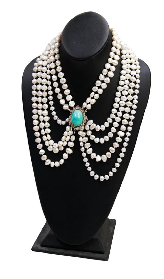MULTI-STRAND BAROQUE PEARL, TURQUOISE NECKLACE: A necklace with multi-strand baroque pearls, all connected to an oval turquoise pendant, and a gold molded buckle molded with rose patterns._x000D_ L:9in(22cm) 253g PEARLS: 1cm_x000D_ TURQUOISE STONE: