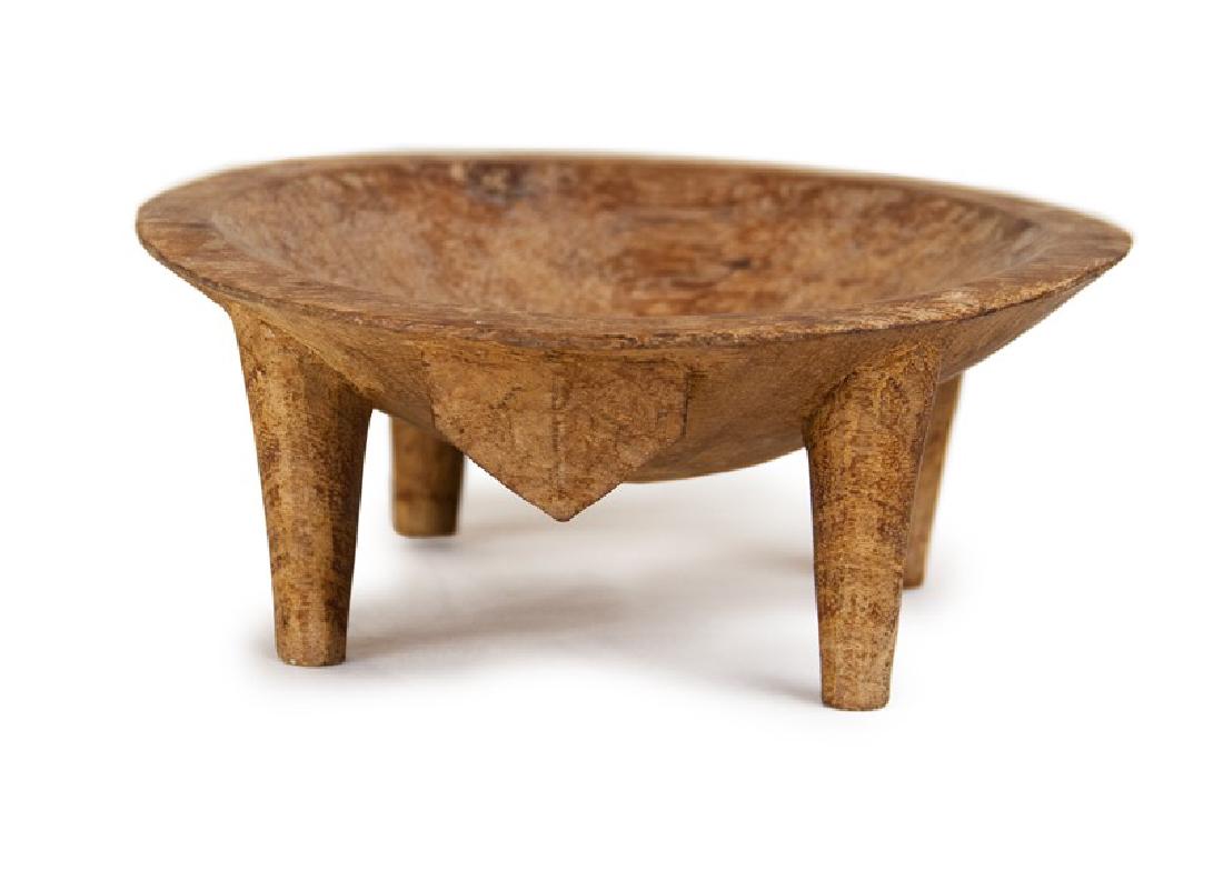 EARLY 19TH CENTURY FIJIAN KAVA BOWL: An Early 19th Century Fijian Kava Bowl. Thinly carved in classical style with four legs and suspension lug. D: 7in (17.7cm) H: 3in (7.5-8cm)