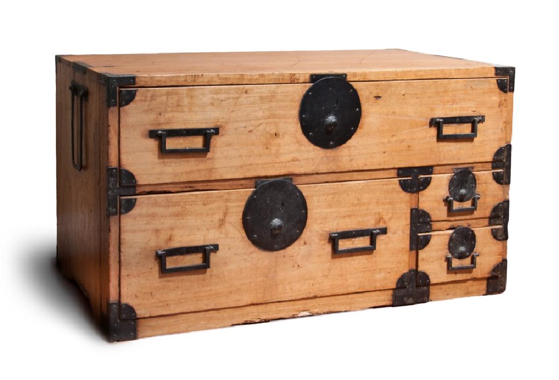 STACKING KIRI WOOD TANSU: A four-drawer stacking tansu made from kiri wood planks, with metal furnishing, possibly intended for clothing storage. (CRATE FACTORY S.F) H:20in(50.8cm) W:37in(94cm) D:16in(40.6cm)