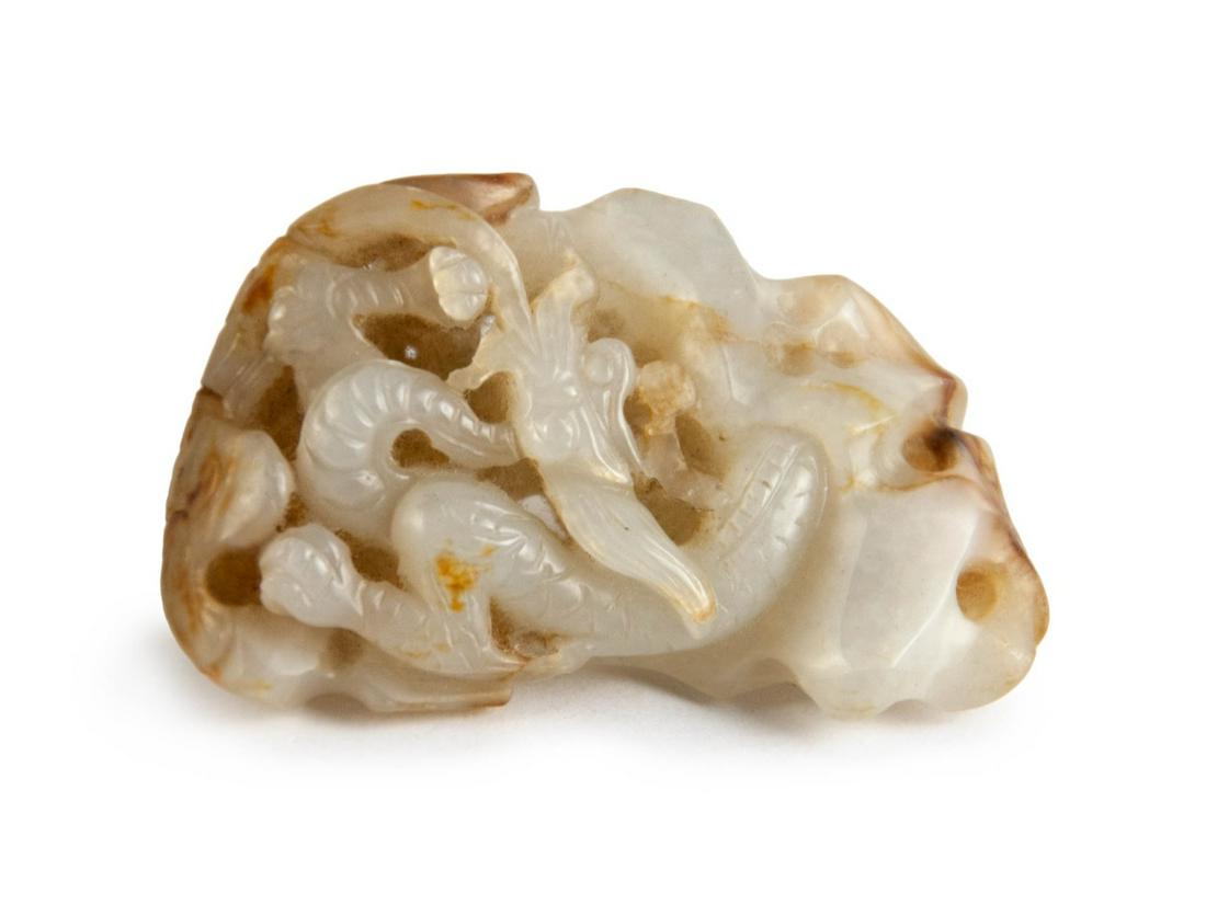 A WHITE CARVED JADE OPENWORK â€˜DRAGONâ€™ TOGGLE (1 of 1)