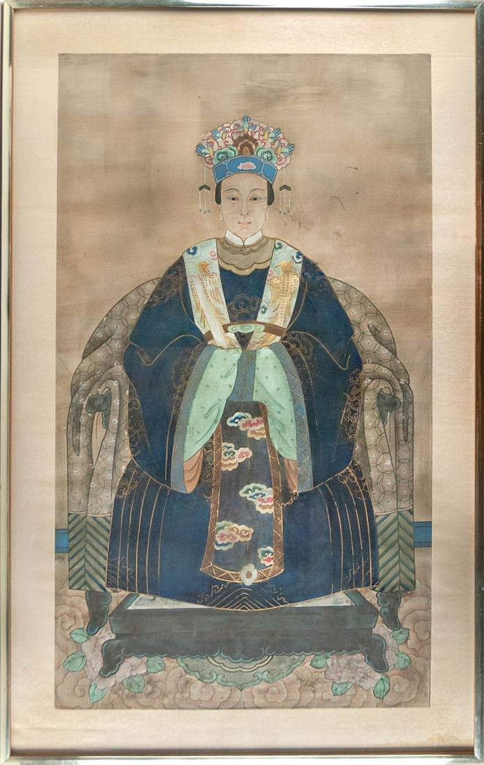 CHINESE FRAMED PAINTING FEMALE ANCESTOR: Seated in cobalt colored robes with cloud pattern sash and Gold Phoenix Lapels, single earrings show she is of low ranking, H:43in(109.2cm) W:26 1/2in(67.3cm)