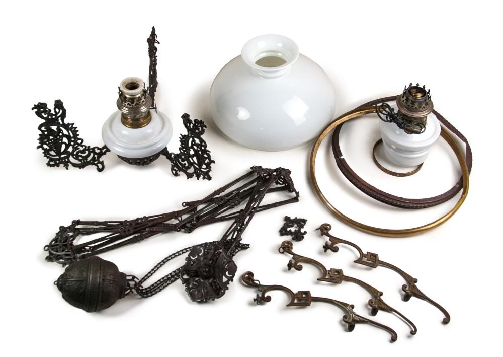 HANGING PARLOUR OIL LAMP: Two disassembled hanging counter-weighted iron and bronze oil lamps with milk glass pieces. Missing parts.
