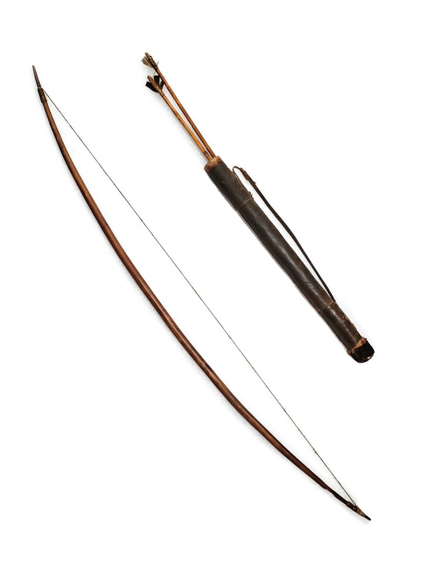 AFRICAN BOW ARROWS AND QUIVER: A bow in wooden and twine fabrication, along with a quiver containing two arrows. The bow's wood has a bark stain, and the twine is wrapped around the top and bottom of the bow multiple times. The qui