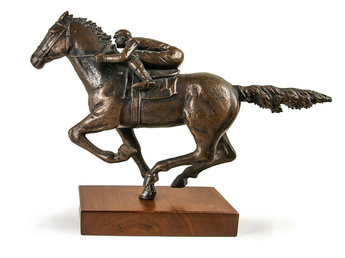 BRONZE FIGURE OF JOCKEY AND HORSE: H:12in(30.4cm) W:16 3/4in(42.5cm)