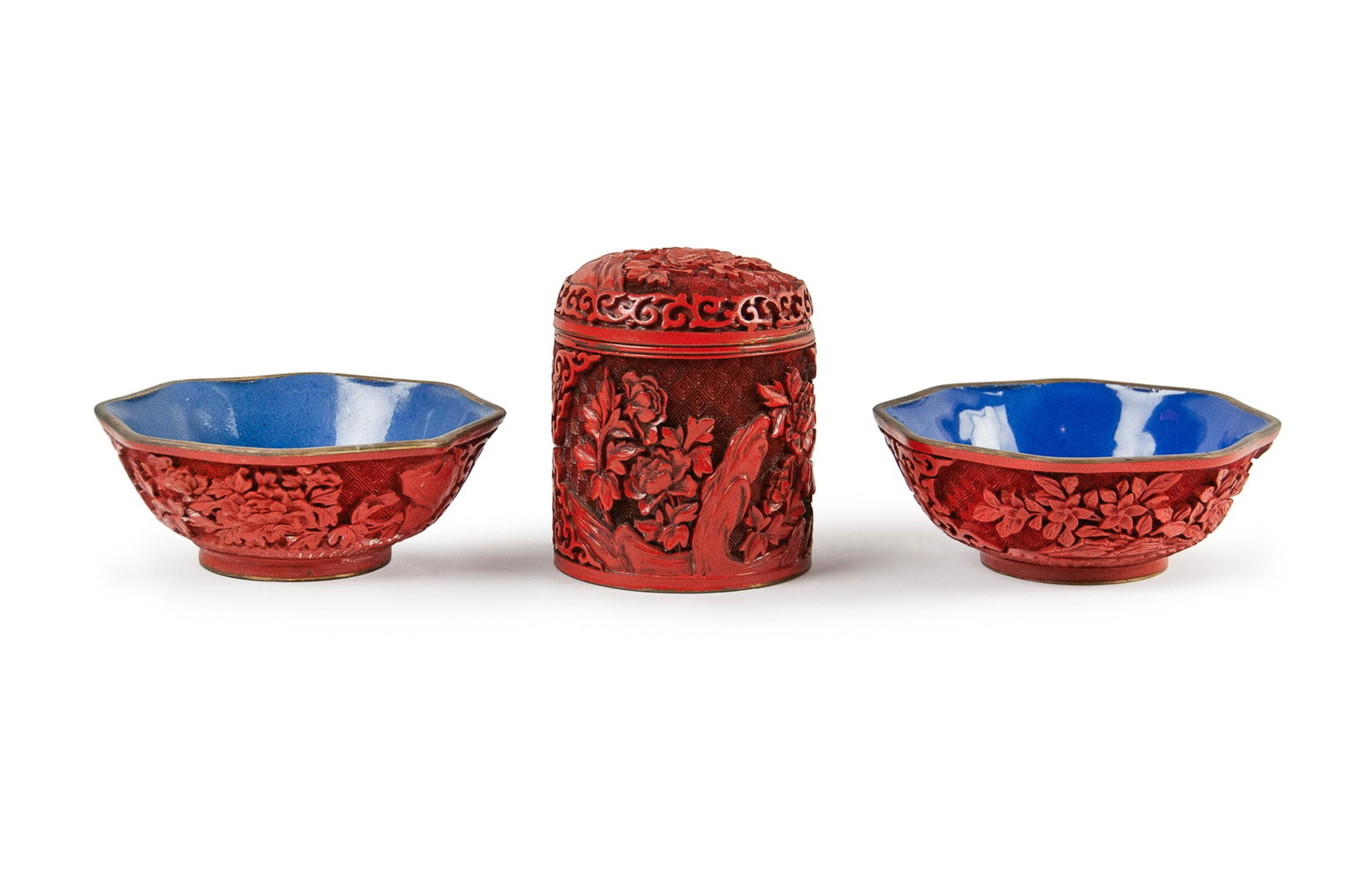 GROUP OF THREE CINNABAR ENAMEL CONTAINER AND BOWLS: H:1 7/8in(4.7cm) W:3 3/4in(9.5cm) H:5in(12.7cm) W:3 1/4in(8.2cm)