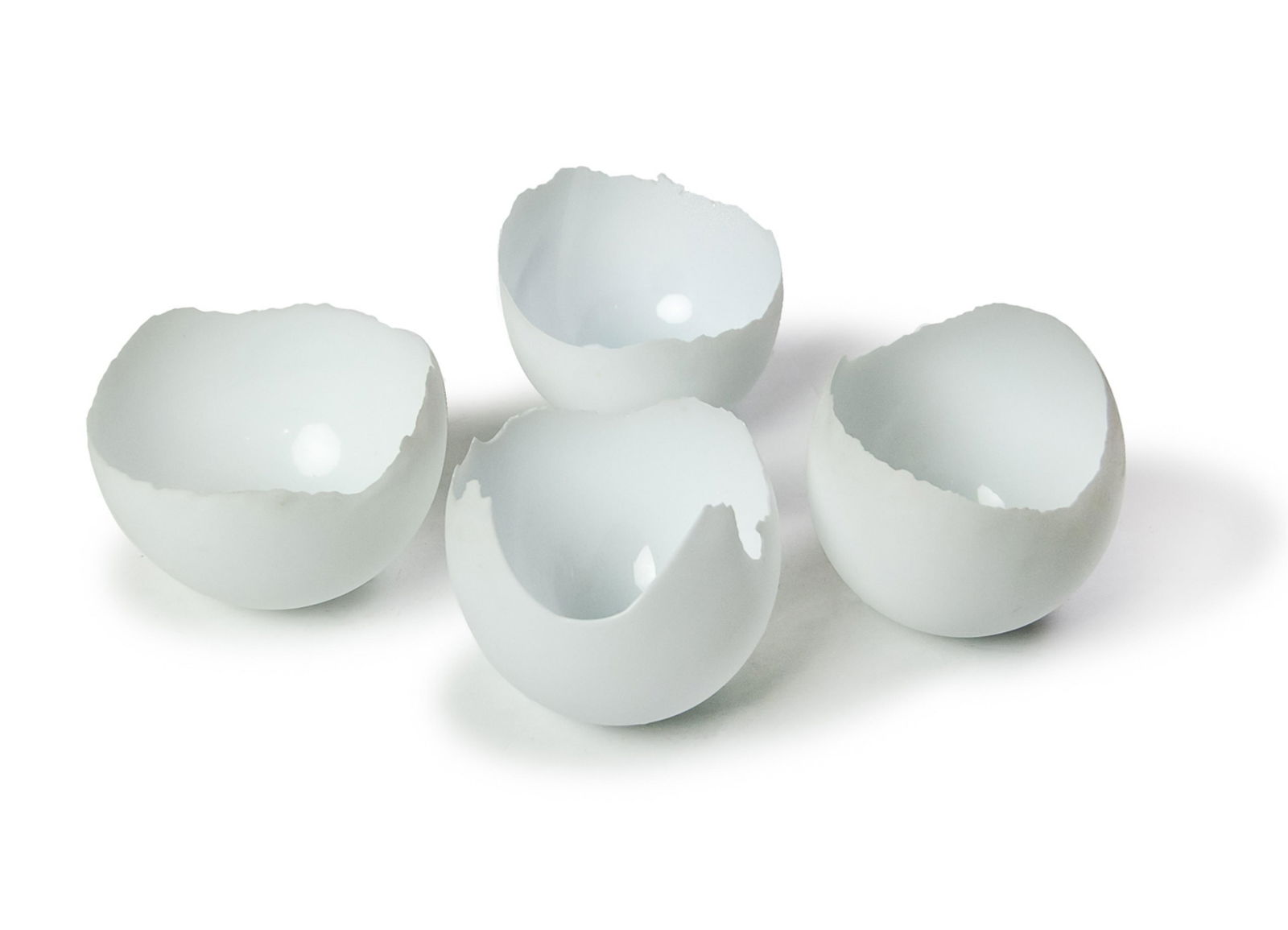 A SET OF FOUR GLASS EGGSHELL SCULPTURES (1 of 3)