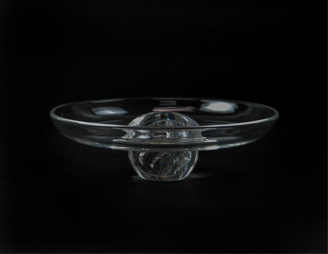 STEUBEN CRYSTAL GALAXY BOWL/ DISH: Pedestal dish with a raised circular design on a stylized ball with an interior bubble design, acid etched on the bottom"Steuben". H:2.5in(6.3cm) D:8in(20.3cm)