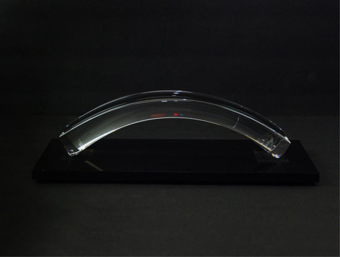 STEUBEN GLASS BRIDGE SCUILPTURE: Sculpture in glass fabrication in the shape of a glass bridge, acid etched on the end "Steuben" It is on a granite base that is detached. H:2 3/4in(6.9cm) W:12in(30.4cm)