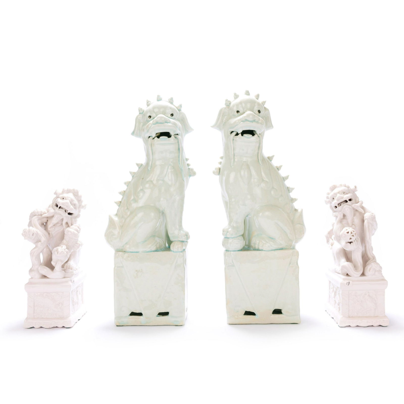 GROUP OF FOUR WHITE PORCELAIN FOU LIONS (1 of 7)