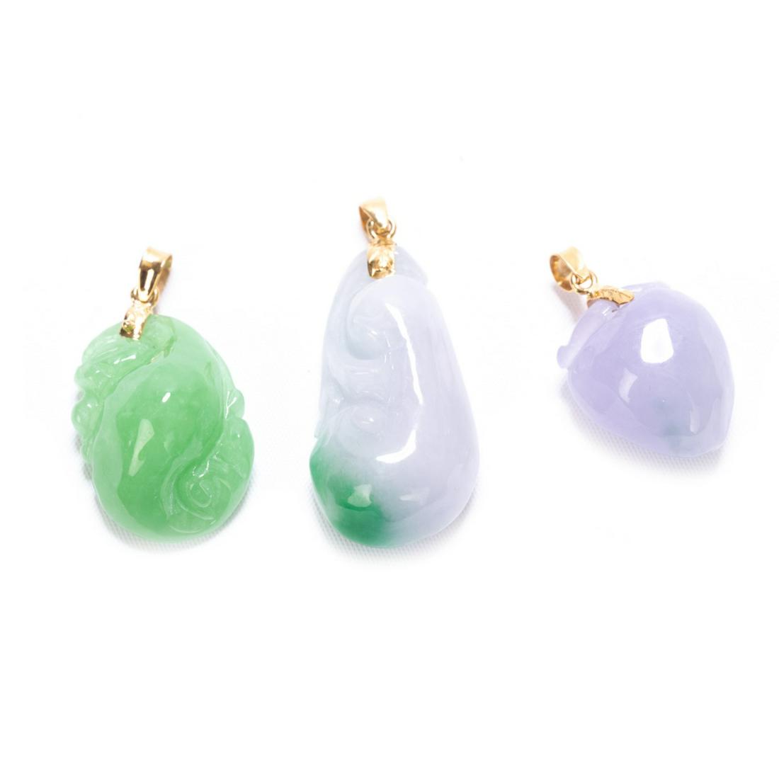 THREE JADEITE PENDANTS (1 of 6)