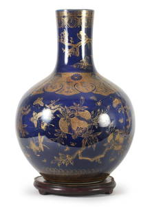 CHINESE PORCELAIN PARCEL GILT BLUE GROUND VASE