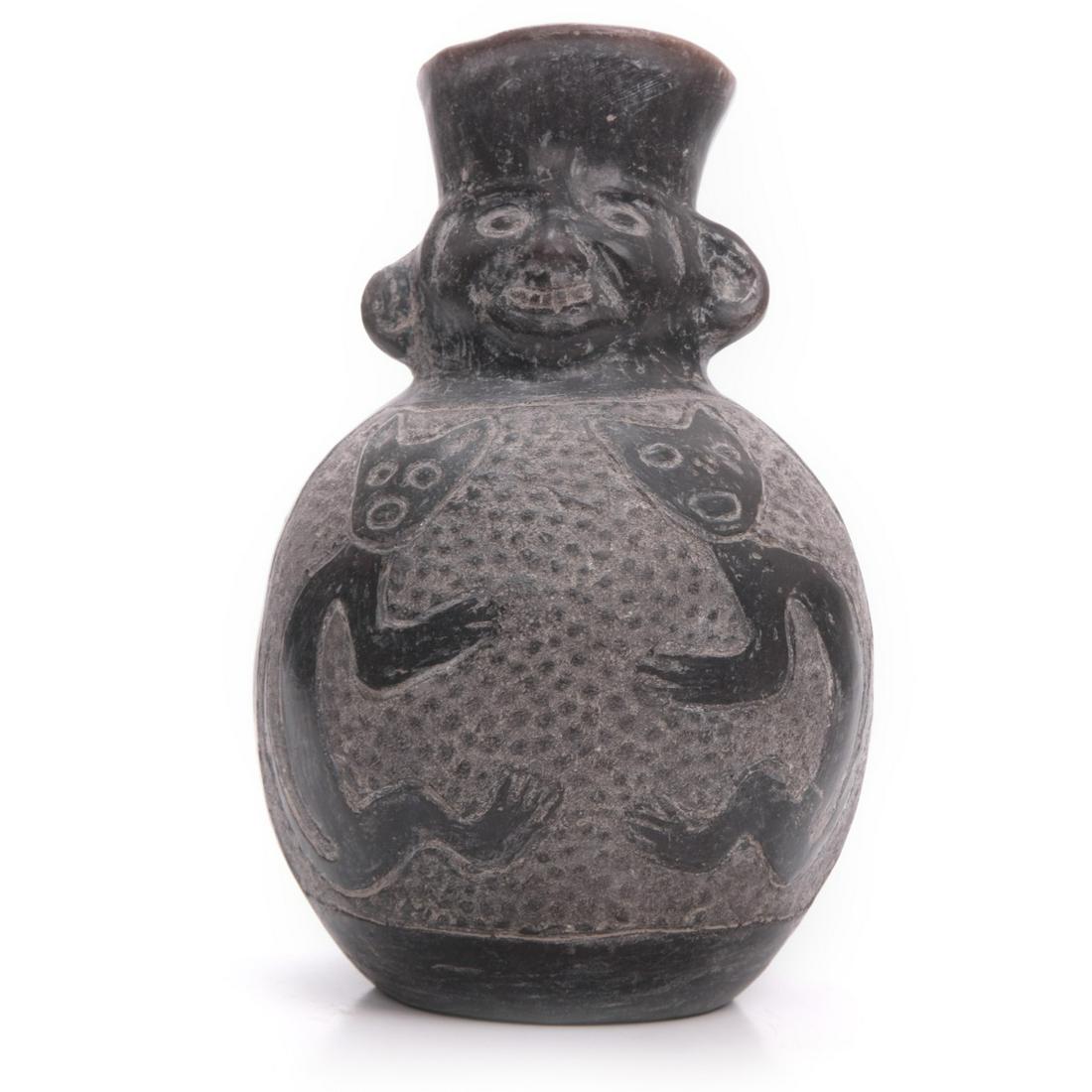 PRE-COLUMBIAN CHIMU BLACKWARE FACE BOTTLE (1 of 6)