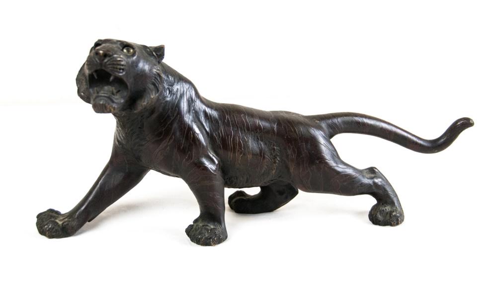 A JAPANESE BRONZE TIGER (1 of 7)