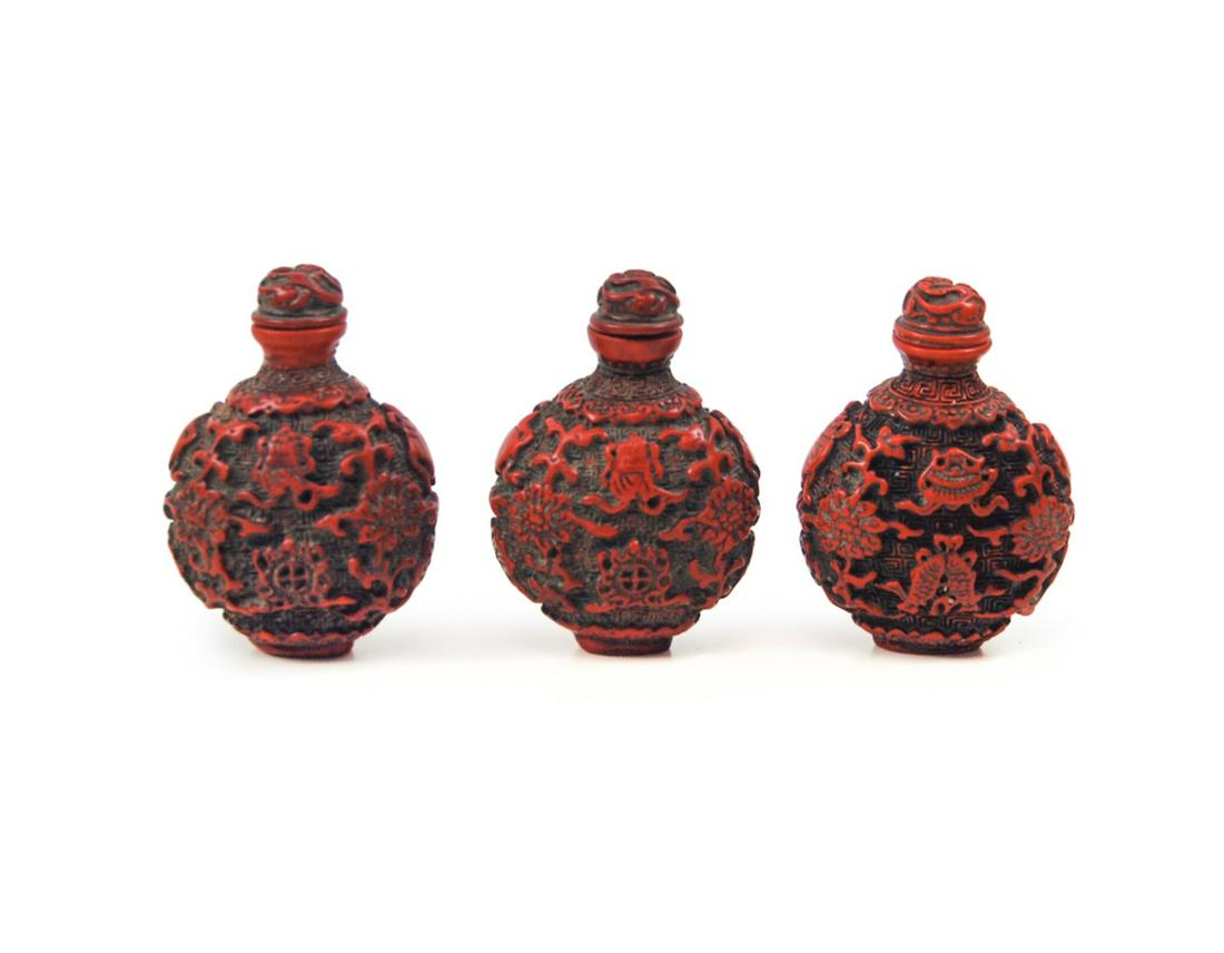 CINNABAR LACQUER SNUFF BOTTLE TRIO (1 of 2)