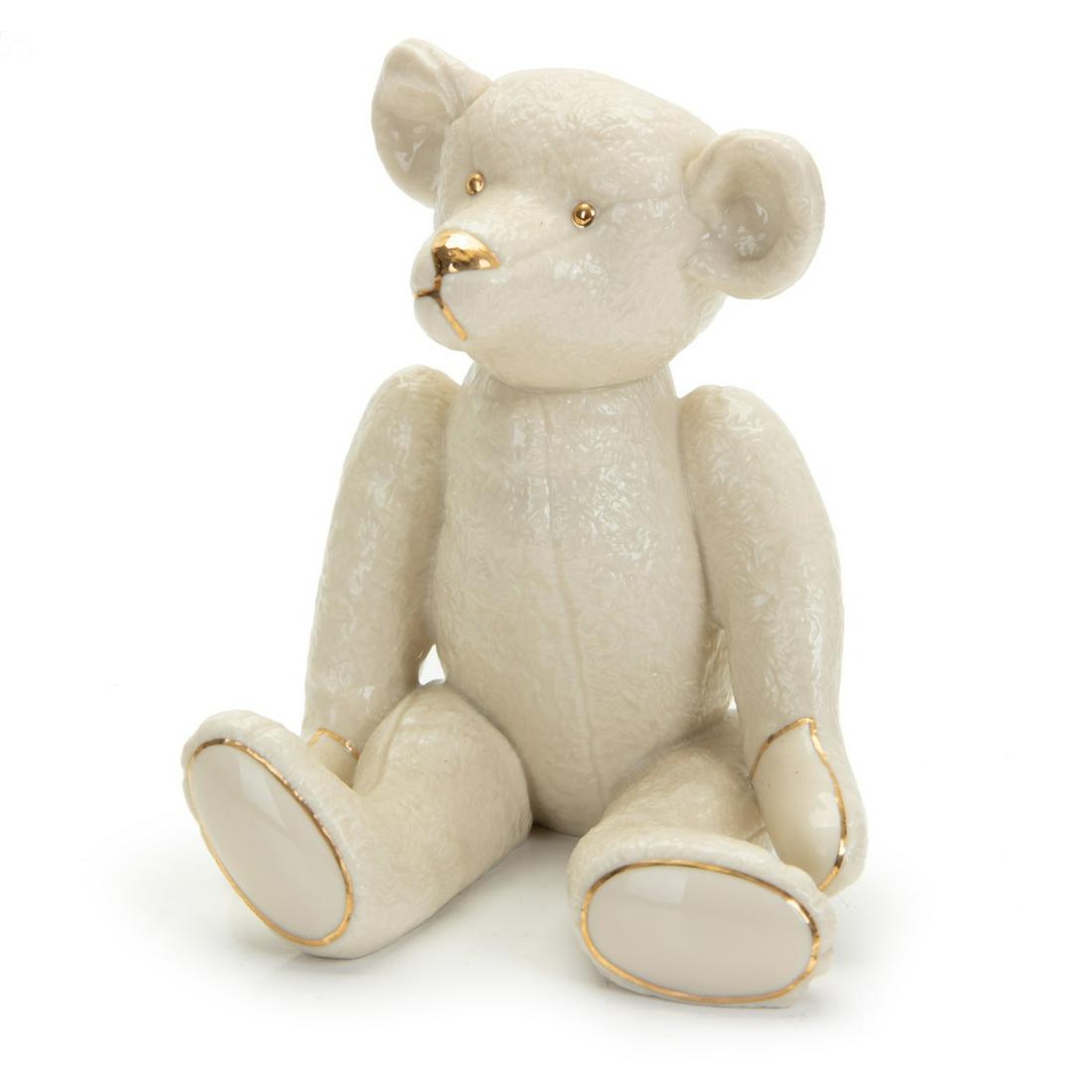 LENOX CENTENNIAL PORCELAIN TEDDY BEAR: Lenox porcelain bear. H:5.25in(13.3cm) W:4in(10.1cm)