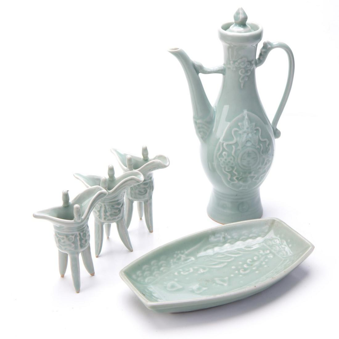 CHINESE PORCELAIN CELADON WINE SET: Chinese porcelain celadon wine set. H:8.75in(22.2cm), H:6.75in(17.1cm), H:3.5in(8.8cm)