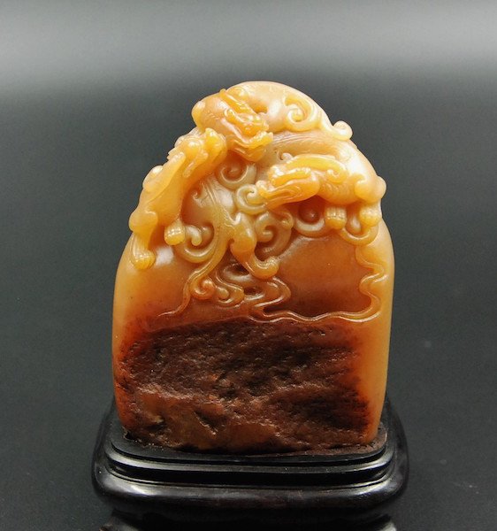 PAGODITE CARVING: Carved soapstone topped with dragons, with a stand. H:5¡± W: 3¡±
