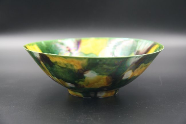 EGG AND SPINACH GLAZED BOWL: Decorated with irregular overlapping yellow, green, brown and cream splashes throughout interior and exterior.
