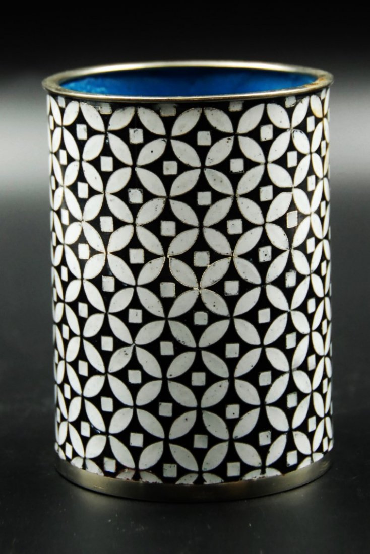 SILVER CLOISENNE CUP: Covered in a uniform geometric pattern, this cloisonnÃ© silver cup has a simple cylindrical shape and a bright blue interior. D:3â€ H:4â€
