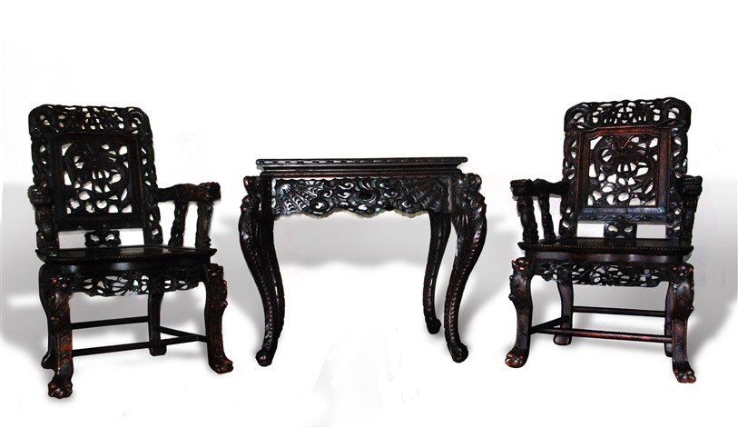 MAHOGANY TABLE AND CHAIR SET: Carved in openwork, this set of mahogany chairs and tables are covered in dragons and cloud-like patterns. H:29 W:28 H:38 W:25