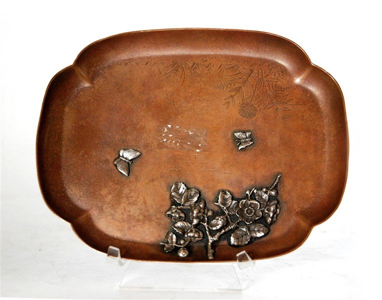 DECORATIVE JAPANESE COPPER PLATE: Etched with flowers, this Japanese copper plate has additionally been adorned with molded metal cherry blossoms and butterflies. L:7.5 W:6