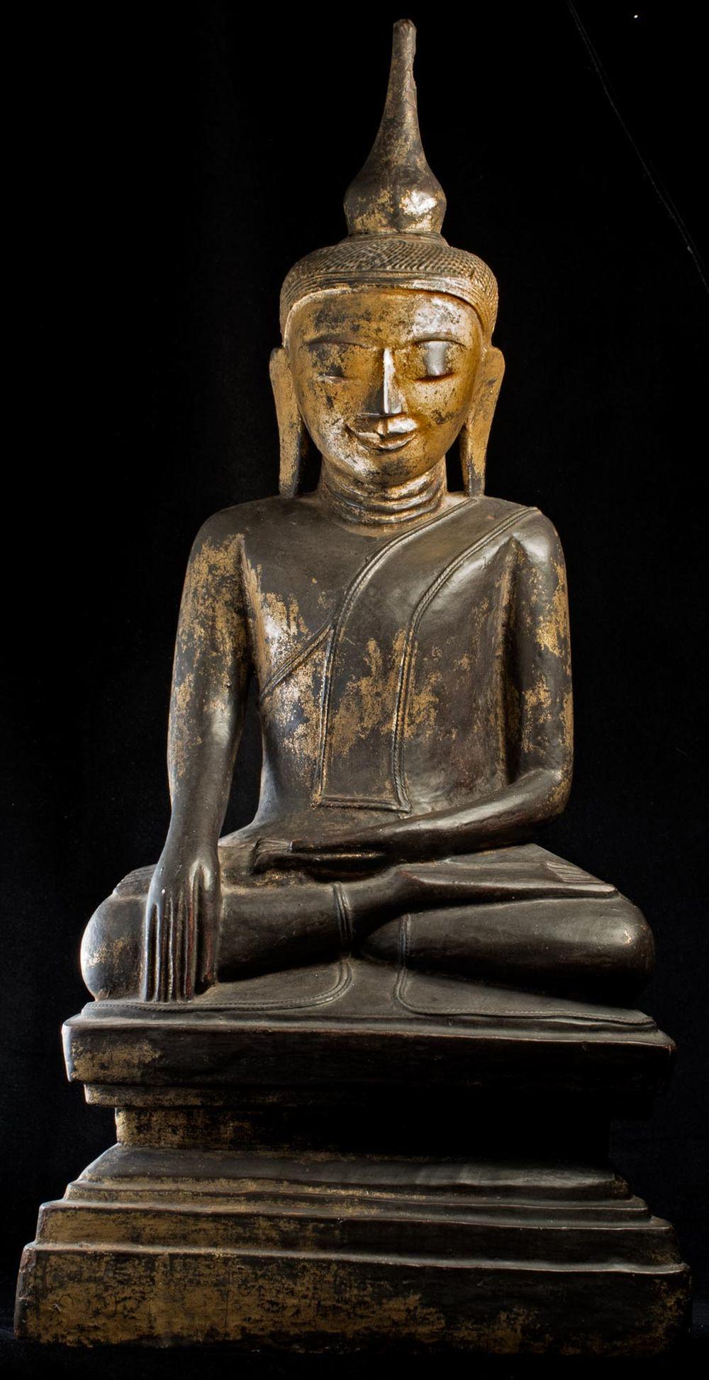17th century late Ava early Shan - Burmese wood Buddha: This piece is a 17th century late Ava early Shan style Burmese wood Buddha. It is in remarkably good condition for a 300-400 year old Buddha made of wood. Part if the reason for this is because it is 