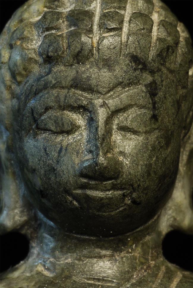 Antique Thai stone Buddha.: Antique Thai stone Buddha. Hard to date with accuracy-looks to be 19thC and possibly earlier. Sits 2 inches tall.