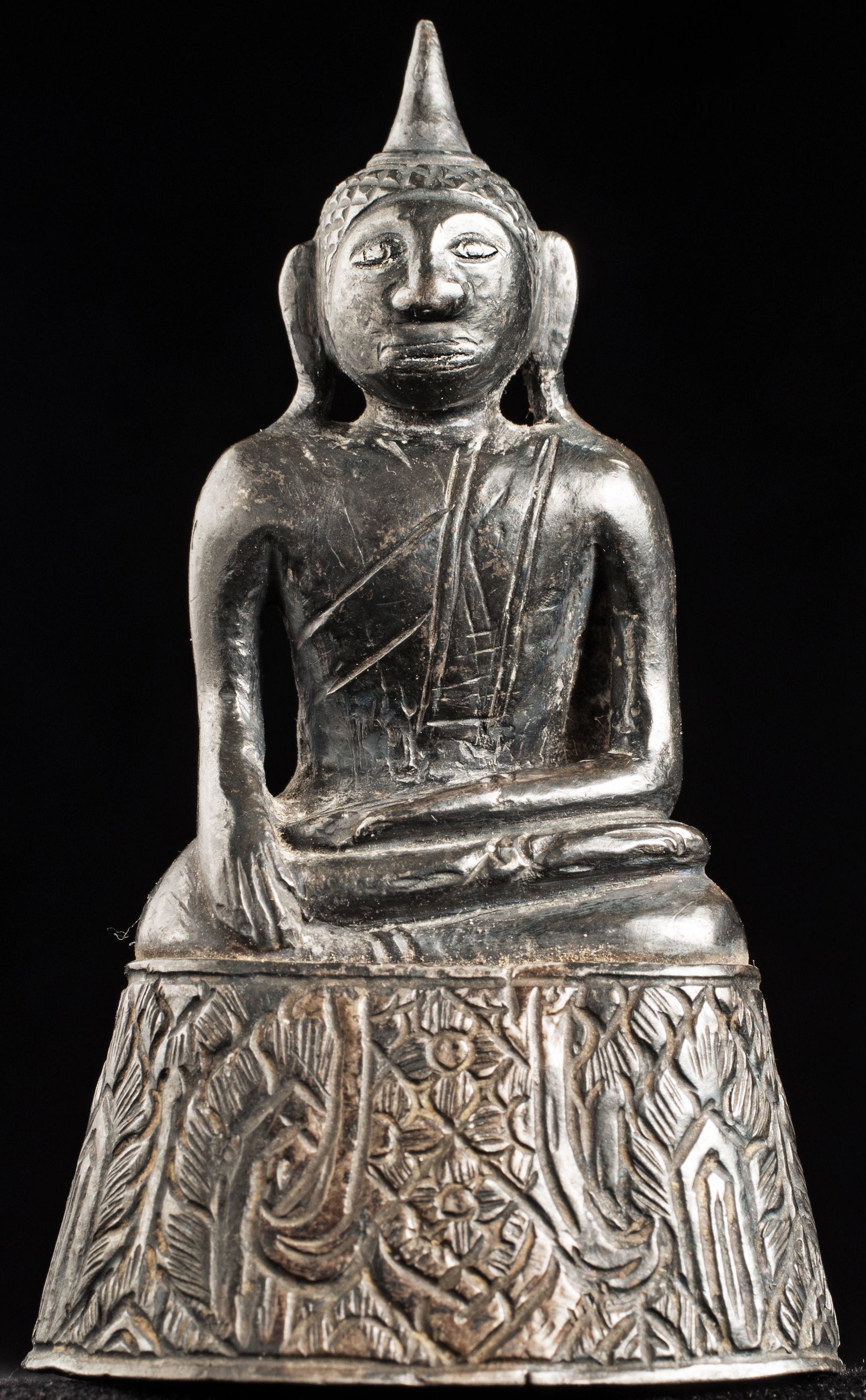 17/18thC Silver Cambodian Buddha--though this fellow: 17/18thC Silver Cambodian Buddha--though this fellow has strong influence from Laos. Very high percentage silver, thickly cast over a clay core. This type is often very thin silver that can be easily 